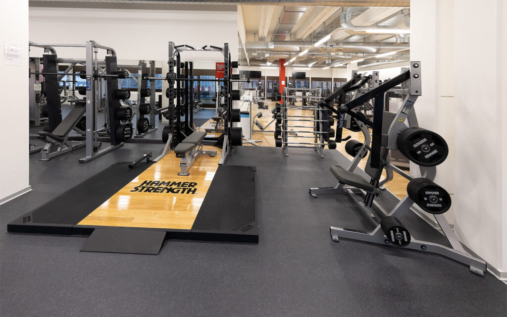 Freihantelbereich Squat Rack Deadlift Plattform Hammerstrength Plate Loaded Geräte
